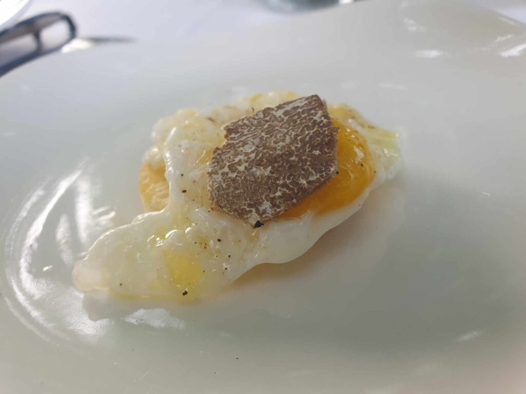 quail egg with black truffle